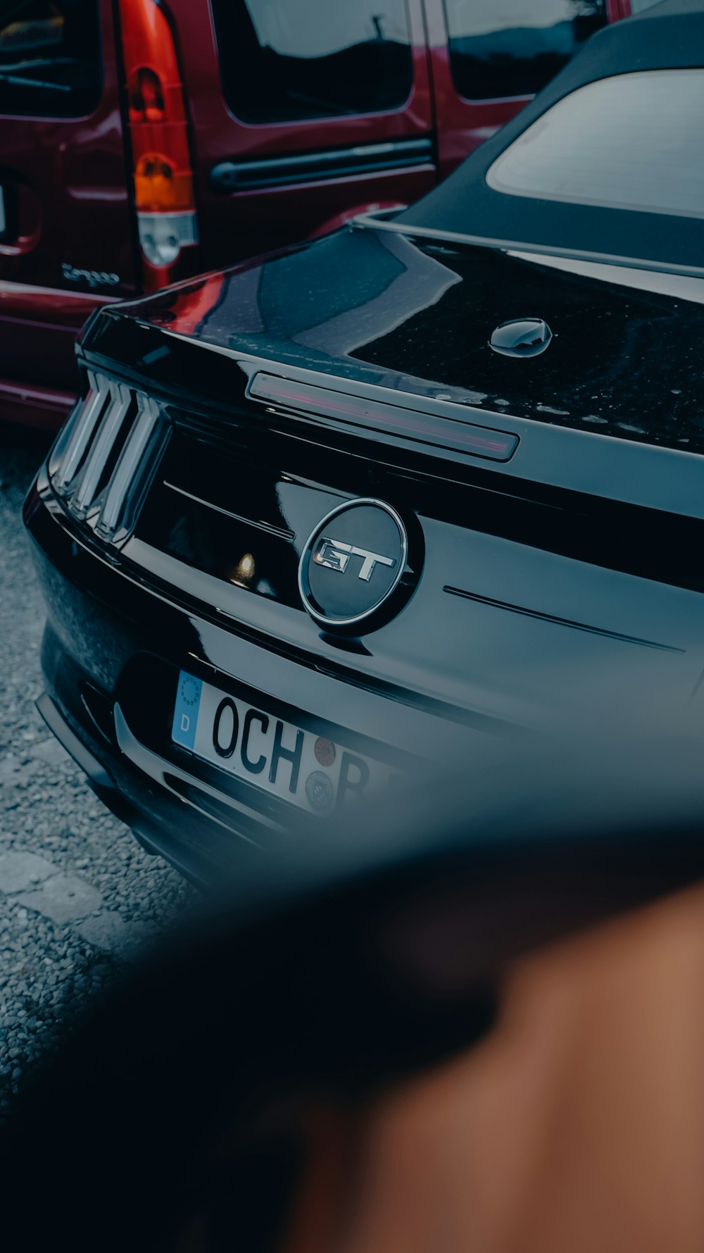 a close up of a car parked in a parking lot