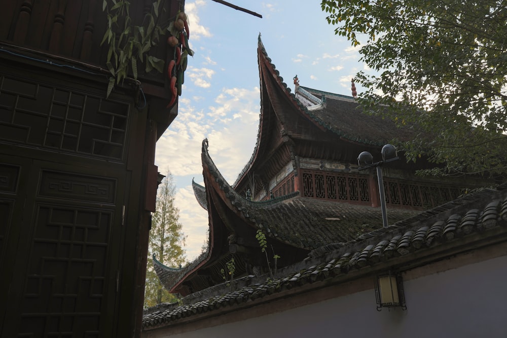 the roof of a building with a sky background