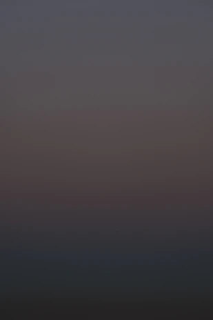Soft gradient from deep navy to black with faint golden topographic lines, capturing the quiet strength of long-term partnership.