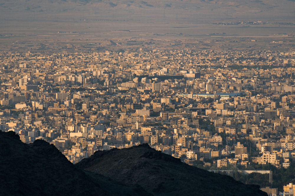 a view of a city from the top of a mountain