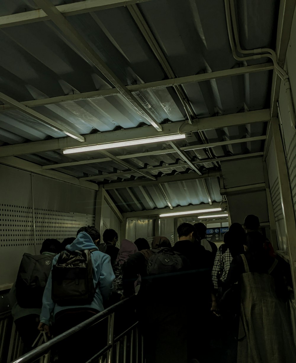 a group of people walking down a flight of stairs