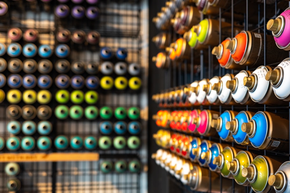 a display of different colors of paint in a store