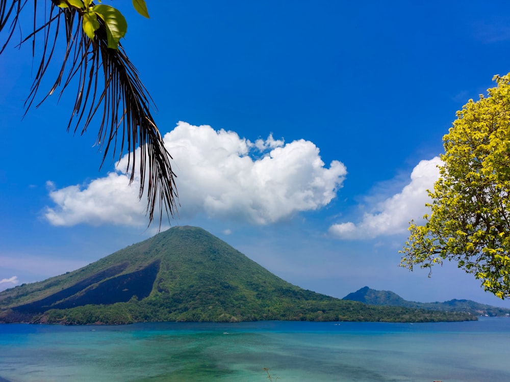 a view of a mountain and a body of water