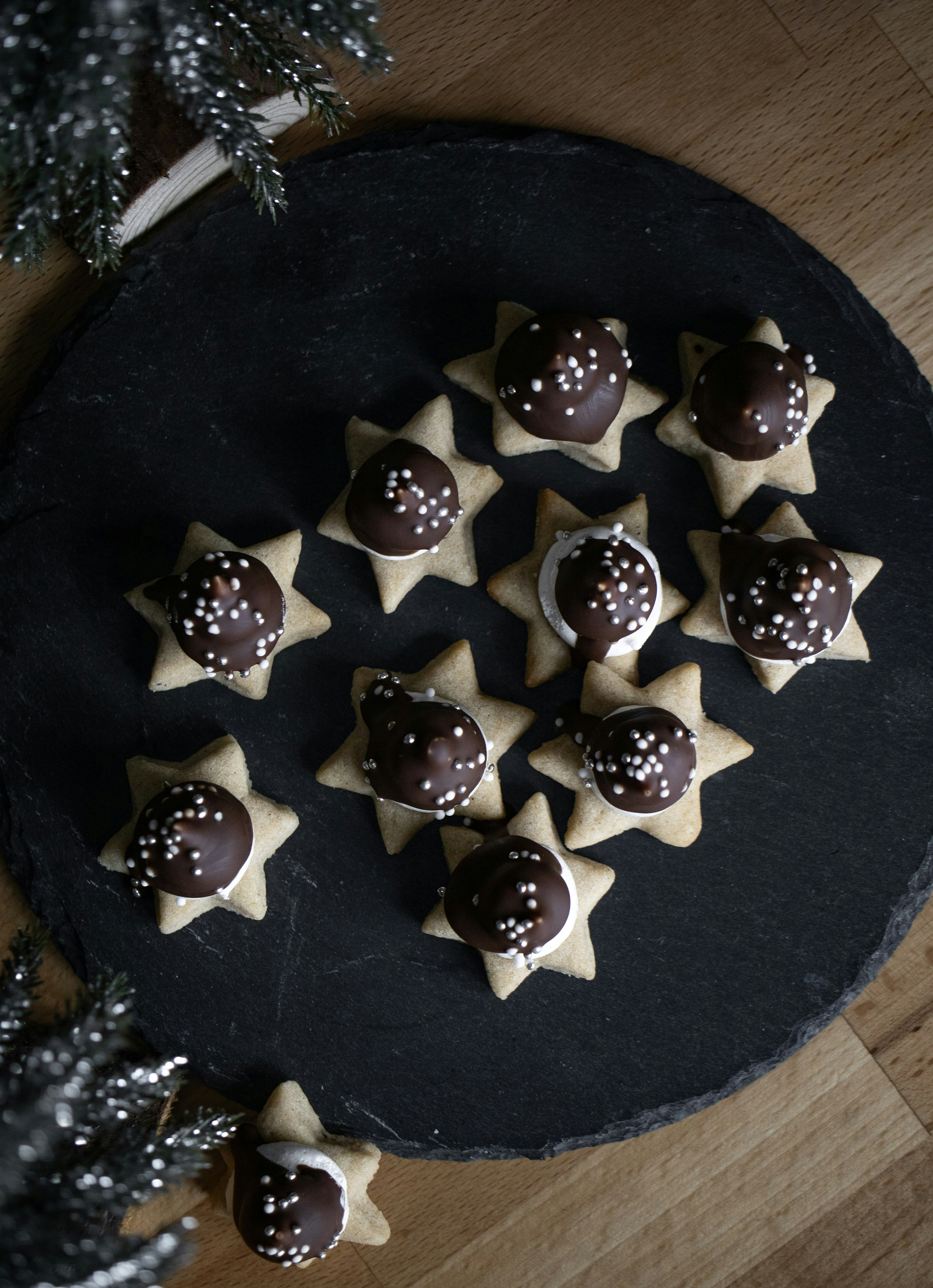 a platter of chocolate covered cookies on a table