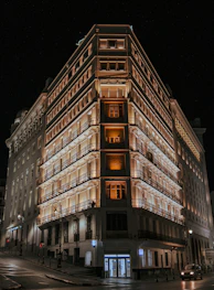 a very tall building lit up at night