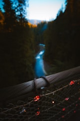 Close-up of a red electric fence installed on a luxury property at dusk