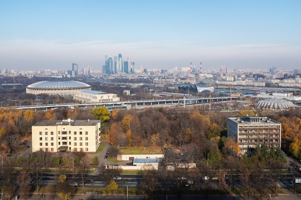 an aerial view of a city with tall buildings