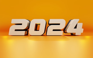 a white number that is next to a yellow wall