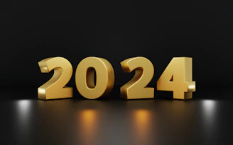 Finished acrylic gel number plates displayed against a dark navy background.