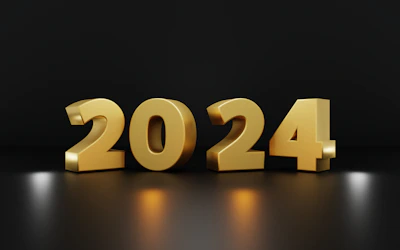 Finished acrylic gel number plates displayed against a dark navy background.