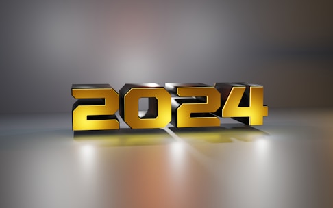 Golden 3D block numbers displaying '2024' on a reflective surface, casting soft shadows and highlights against a gradient background.