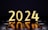 Large, bold numerals forming the year 2024 in a bright, glowing yellow hue against a dark, reflective background. The numbers appear three-dimensional and are mirrored on the shiny surface below.