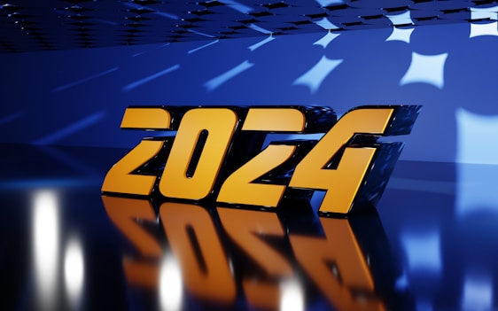 Large 3D numbers in a glossy gold finish reflect on a shiny blue floor. The numbers are positioned under a ceiling with geometric patterns, casting dynamic shadows and reflections across the scene.