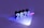 The image consists of the number 2024 in bold, three-dimensional text that seems to be illuminated by colorful lights. The background is a rich purple hue with blue and pink lighting effects casting shadows and reflections on the surface.
