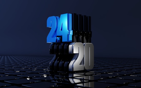 A futuristic scene featuring large, bold numbers '24' and '20' standing on a reflective grid surface. The number '24' is in a vibrant blue, while '20' is in a metallic silver. The grid reflects the numbers, adding depth to the image, which is set against a dark, minimalist background.