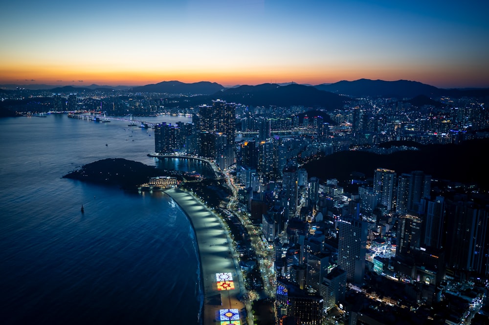 an aerial view of a city at night