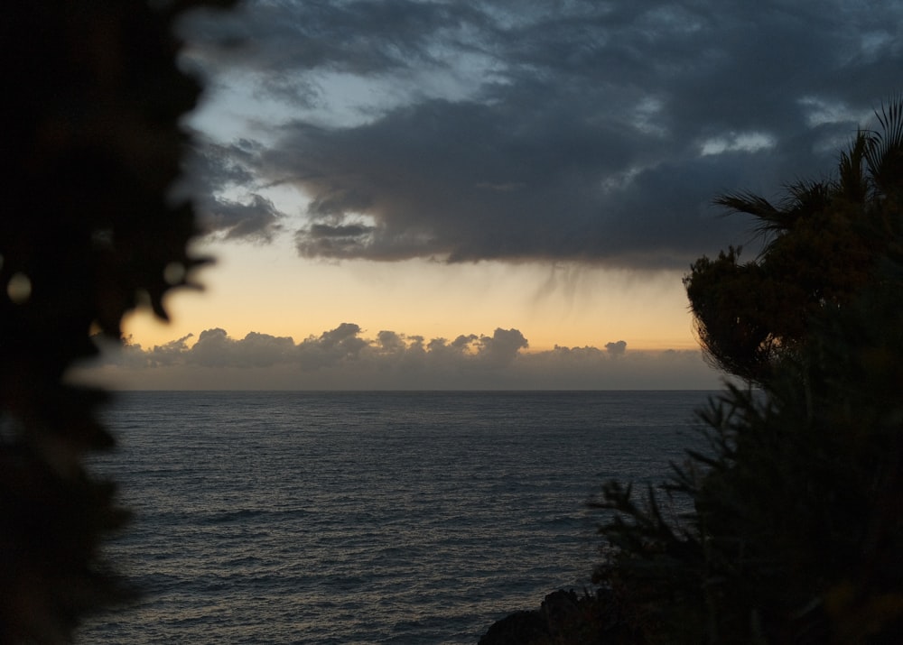 a view of a body of water at sunset