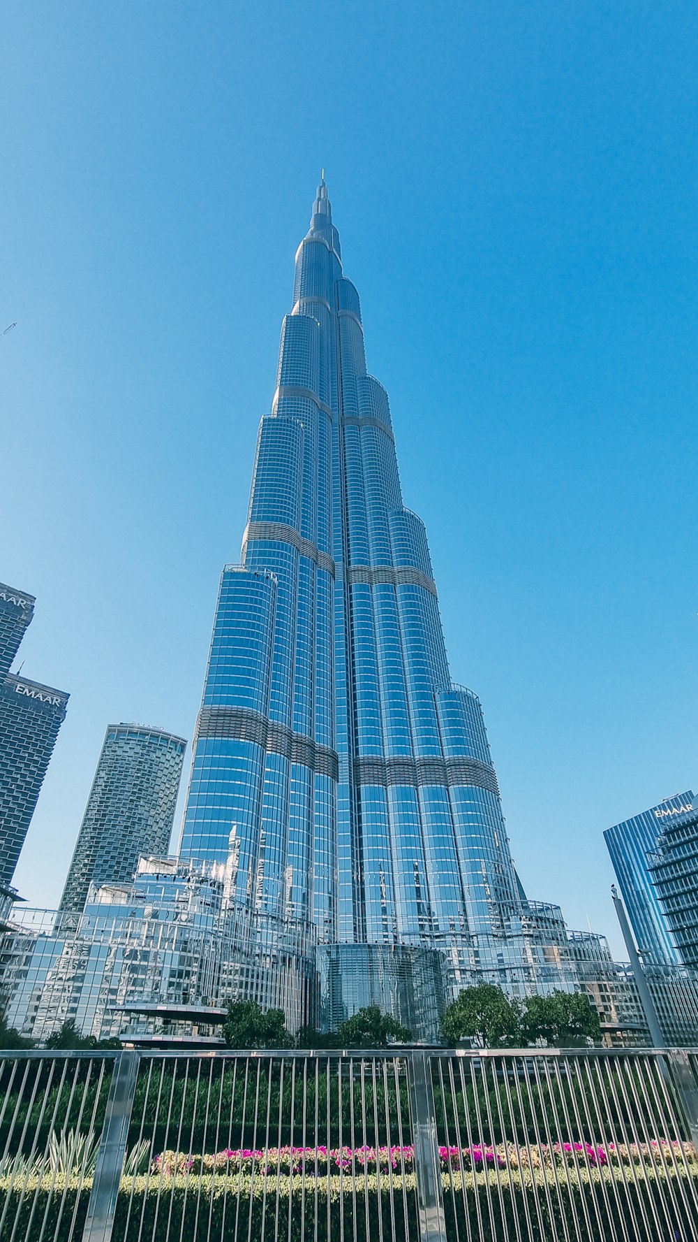 a very tall building towering over a city