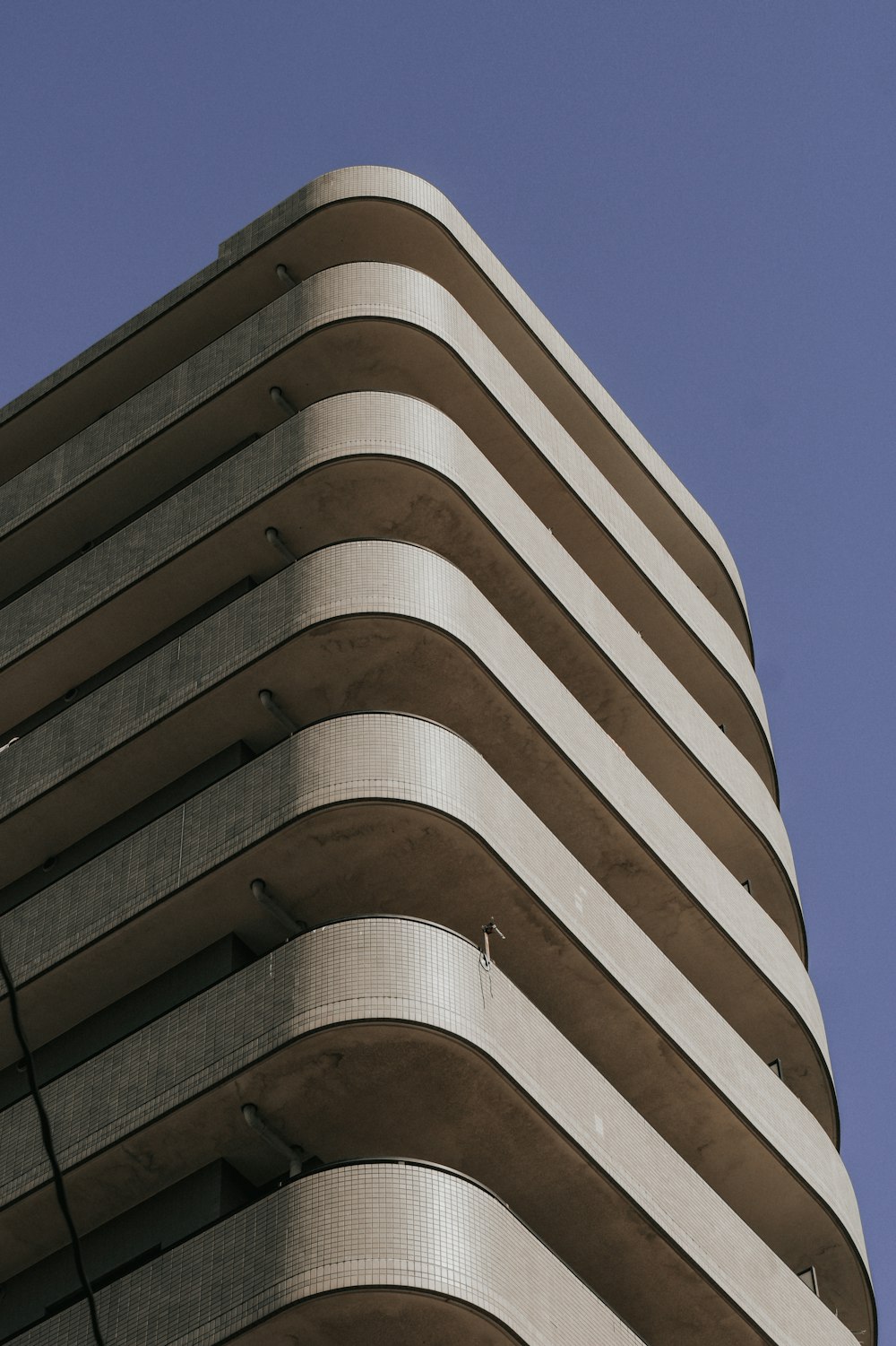 a tall building with a clock on the side of it