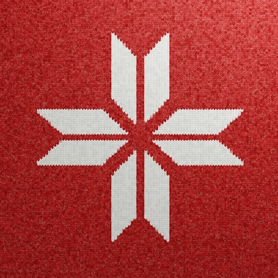 A modern Christmas card with minimalist snowflake patterns on a white background.