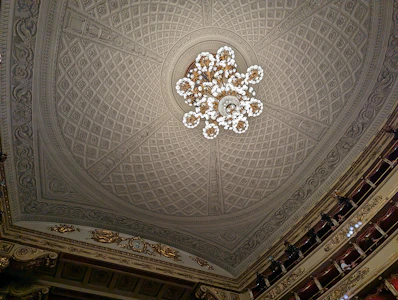 a chandelier hanging from the ceiling of a building