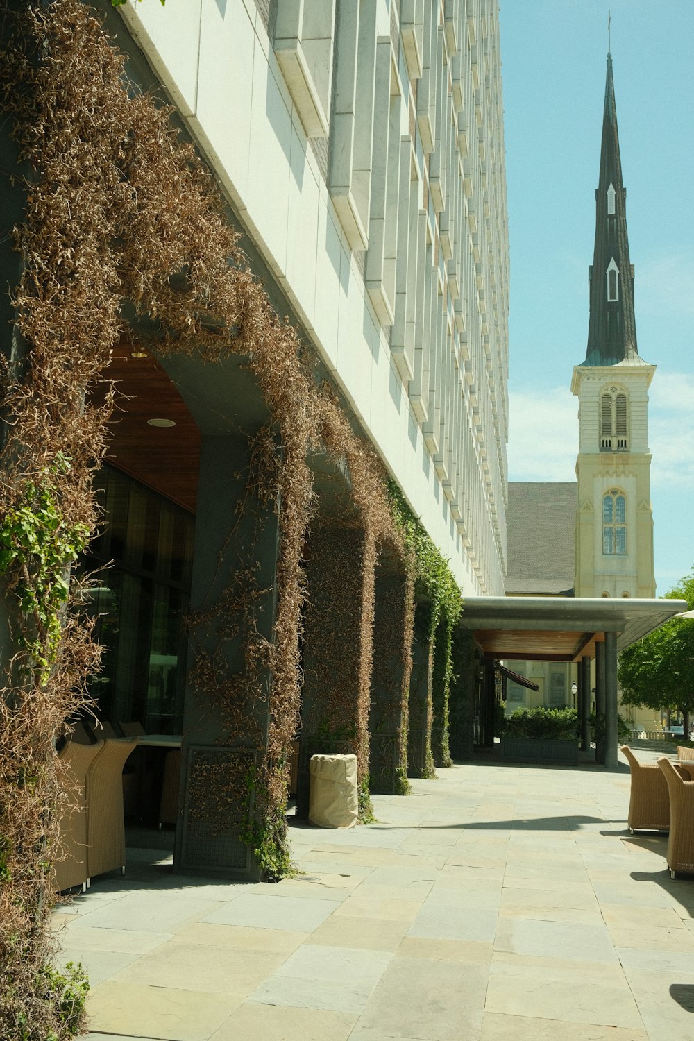 a building with a clock tower in the background