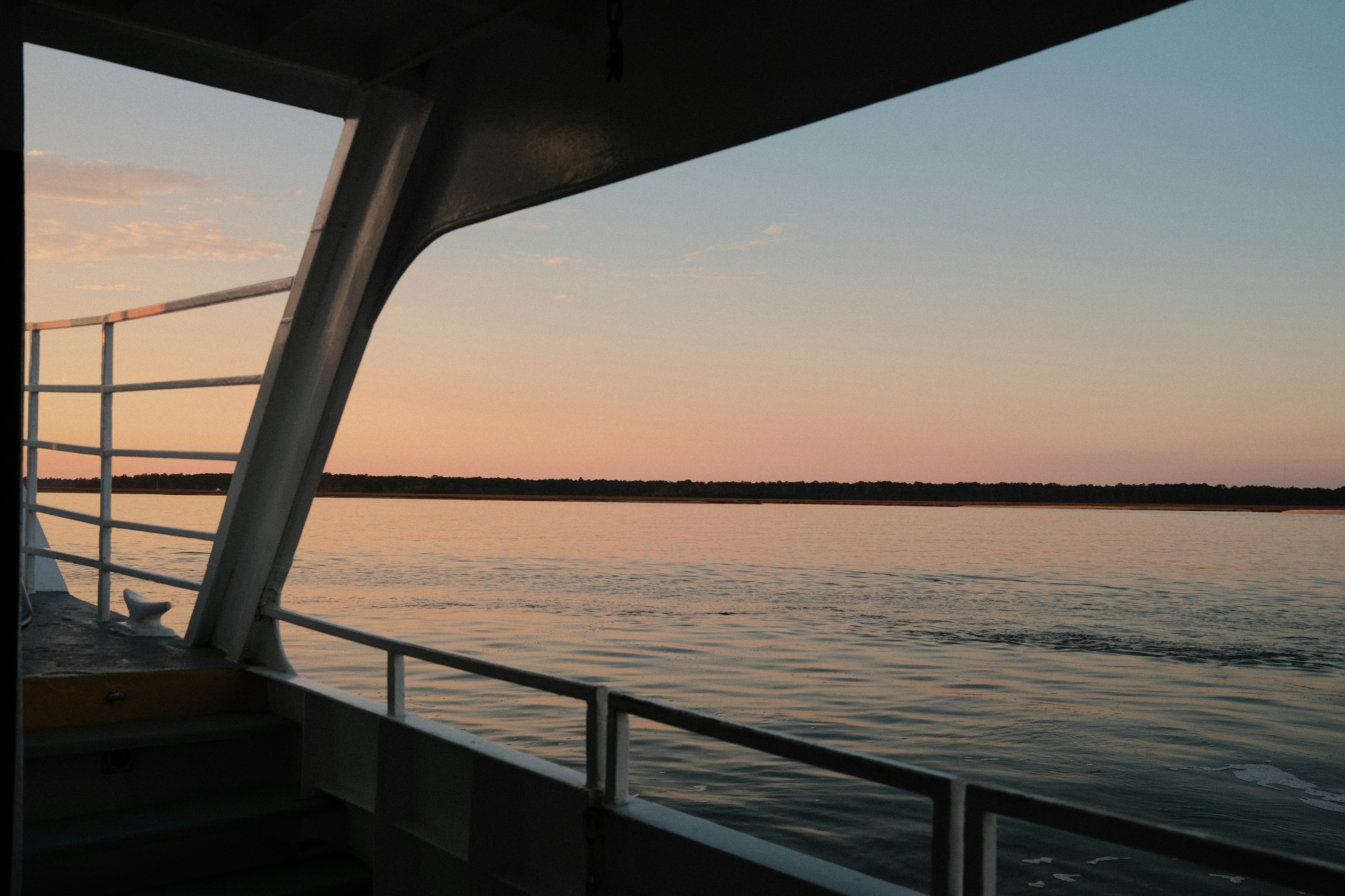 a boat traveling across a large body of water