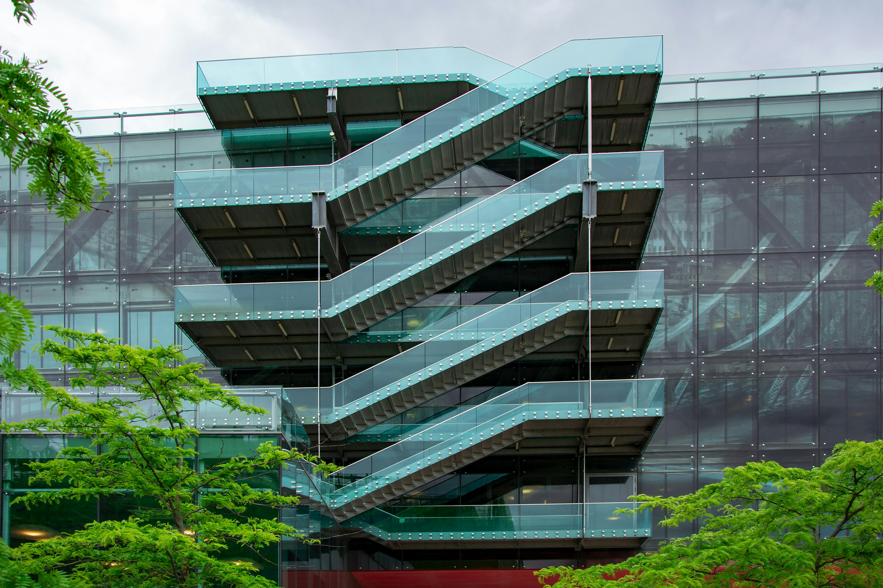 a very tall building with a bunch of stairs in front of it