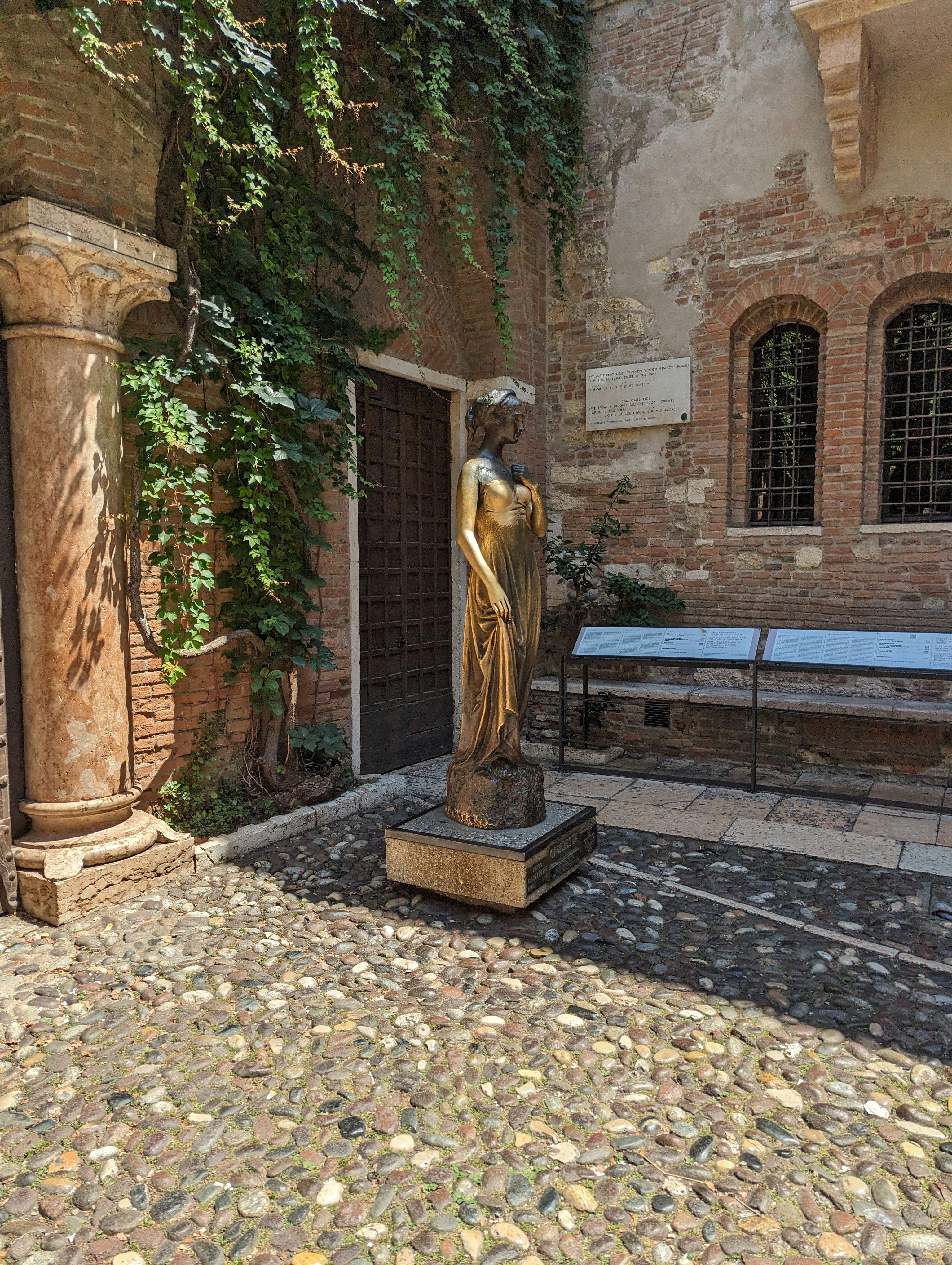 a statue of a woman in a courtyard