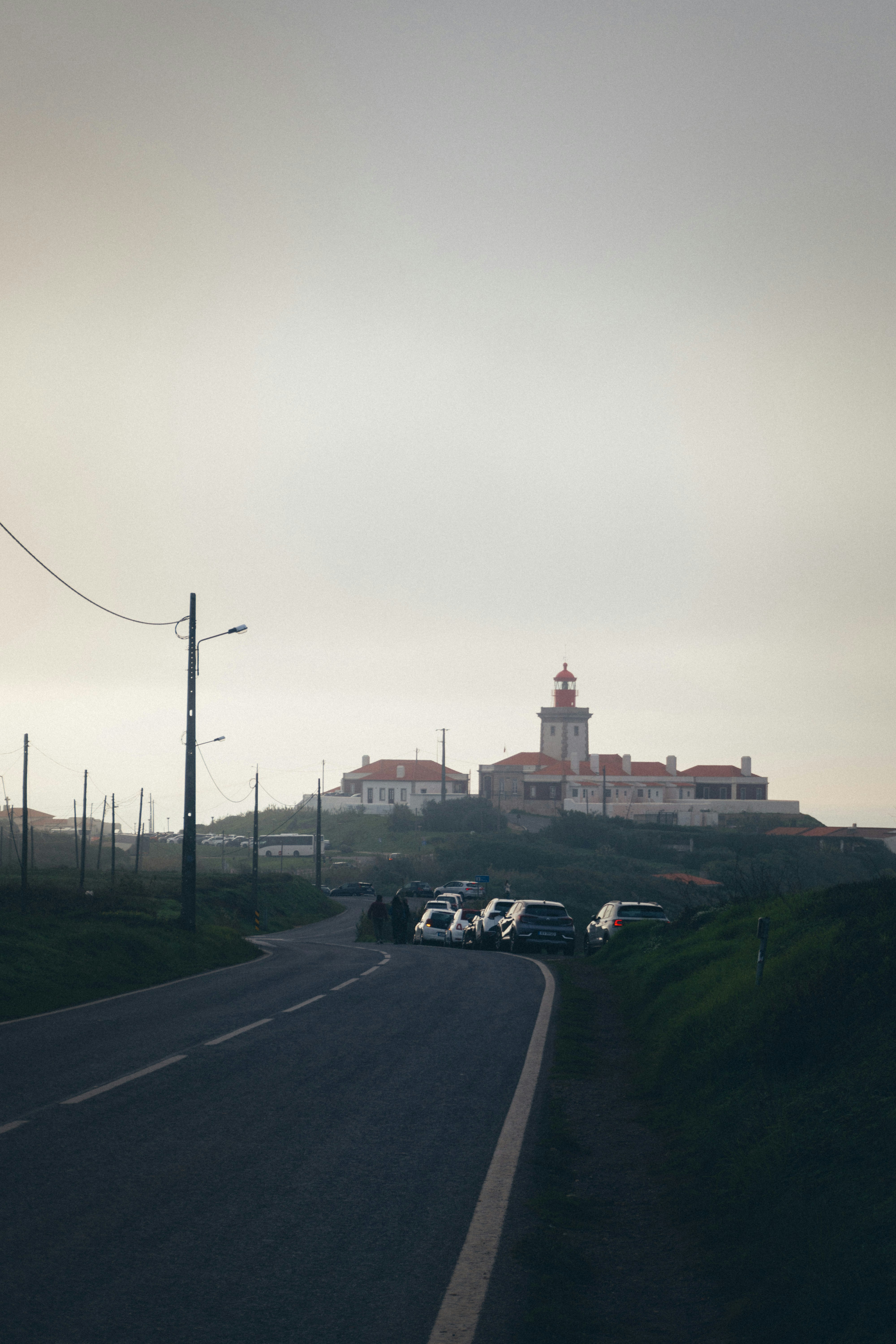a group of cars parked on the side of a road