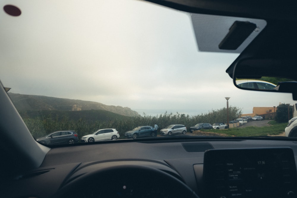 a bunch of cars that are parked in a lot