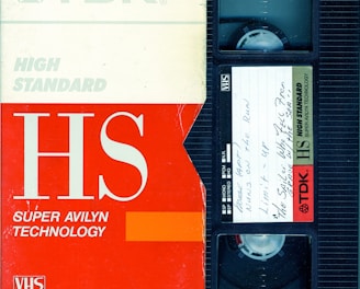 an old vhs tape recorder with the words hs on it