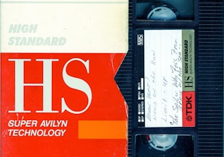 an old vhs tape recorder with the words hs on it