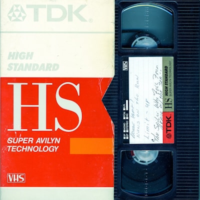 an old vhs tape recorder with the words hs on it