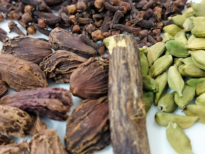 a close up of a bunch of different types of spices
