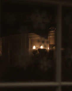 Elegant wall sconces illuminating a cozy living room.