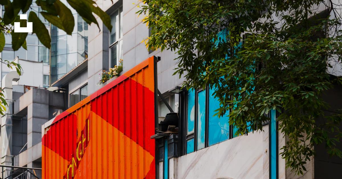 Panic Building Colors A building that has a bunch of different colors on it photo – Free ...