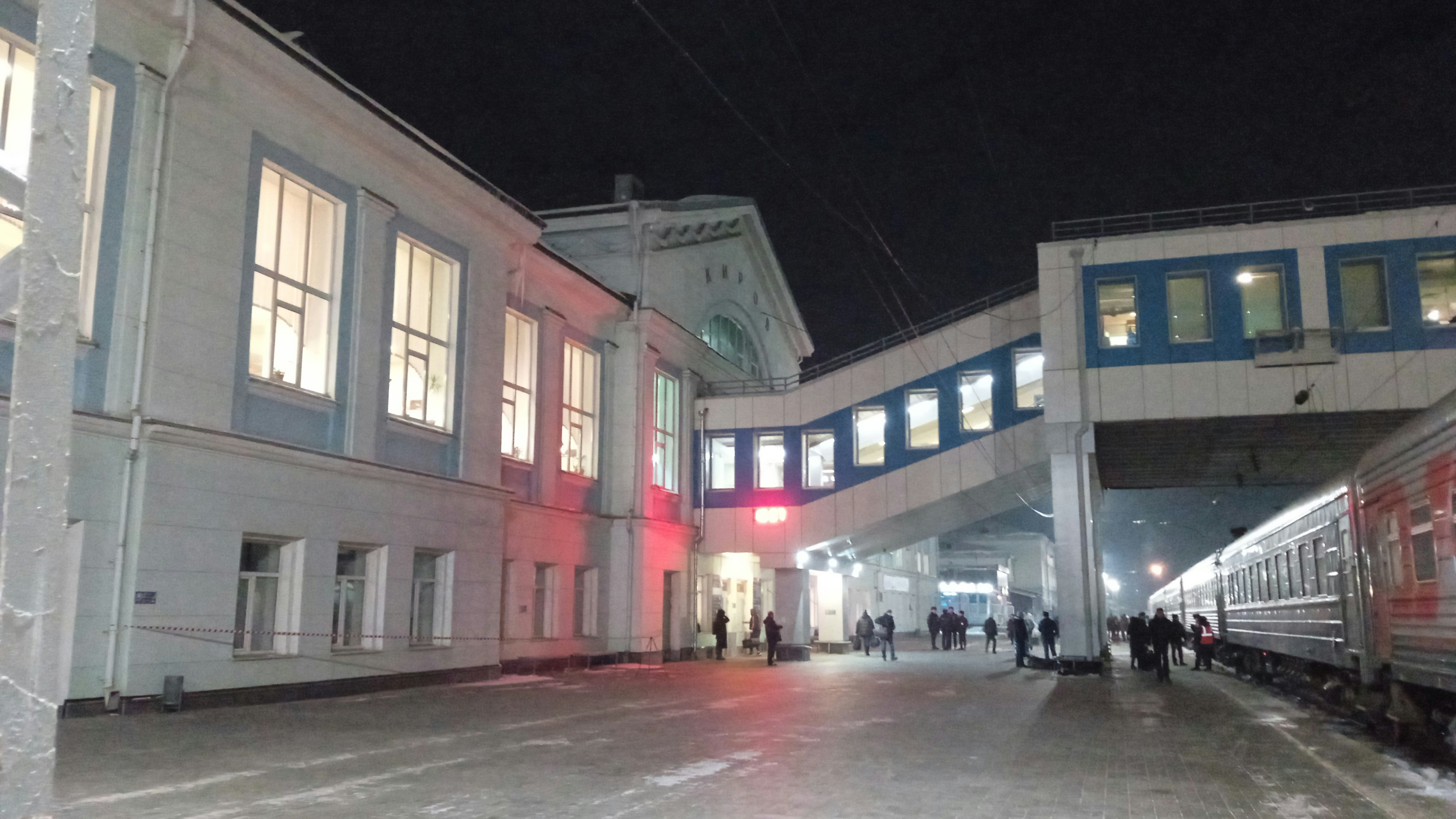 a train that is sitting in front of a building