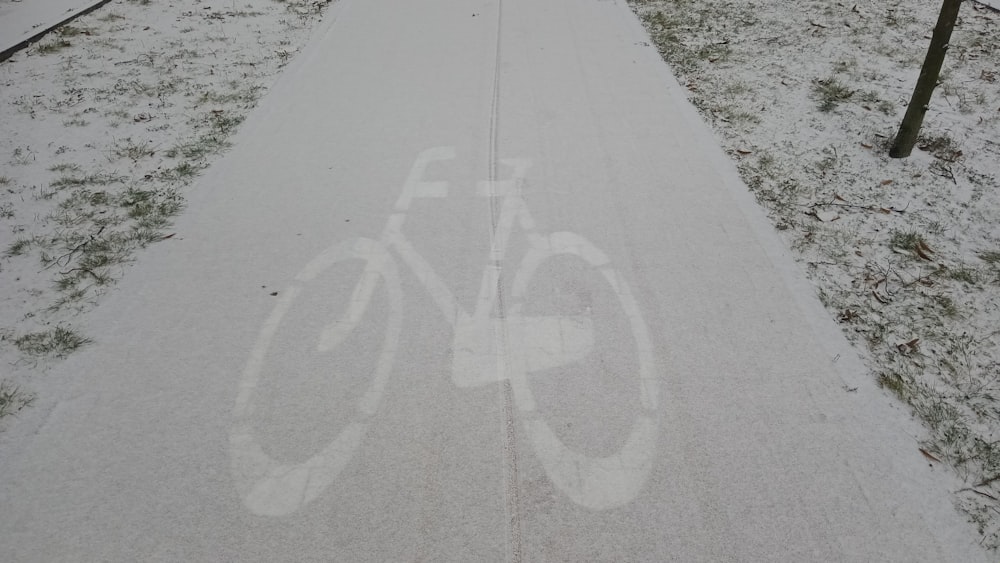 a bike path with a bicycle painted on it