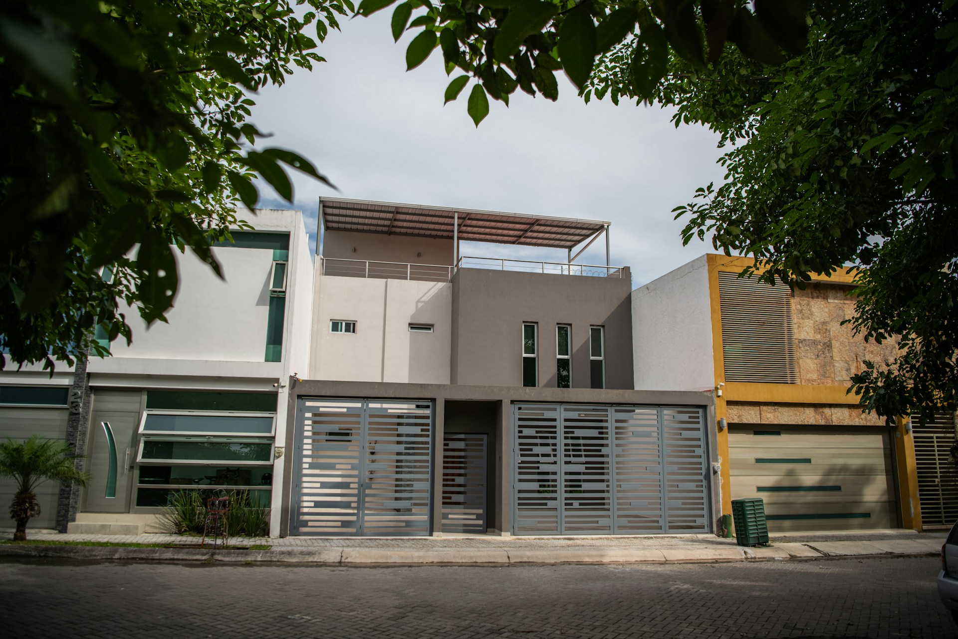 black and brown leather padded tub sofa