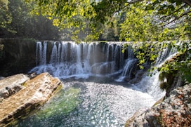 a waterfall with a large amount of water coming out of it