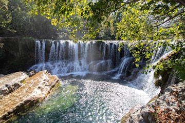 a waterfall with a large amount of water coming out of it