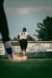 a person running on a baseball field