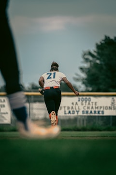 a person running on a baseball field