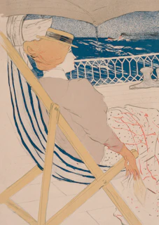 A stylish woman on a cruise deck wearing a flowing sundress and sunhat, with the ocean and ship rail in the background.