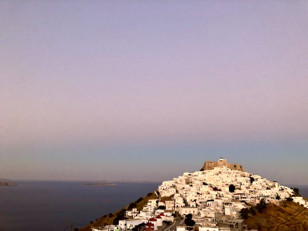 a hill that has a bunch of buildings on it