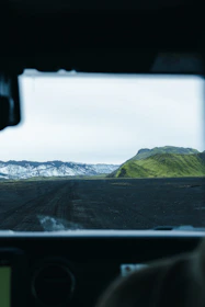 Traveler enjoying a scenic drive through Arequipa's volcanic landscapes.