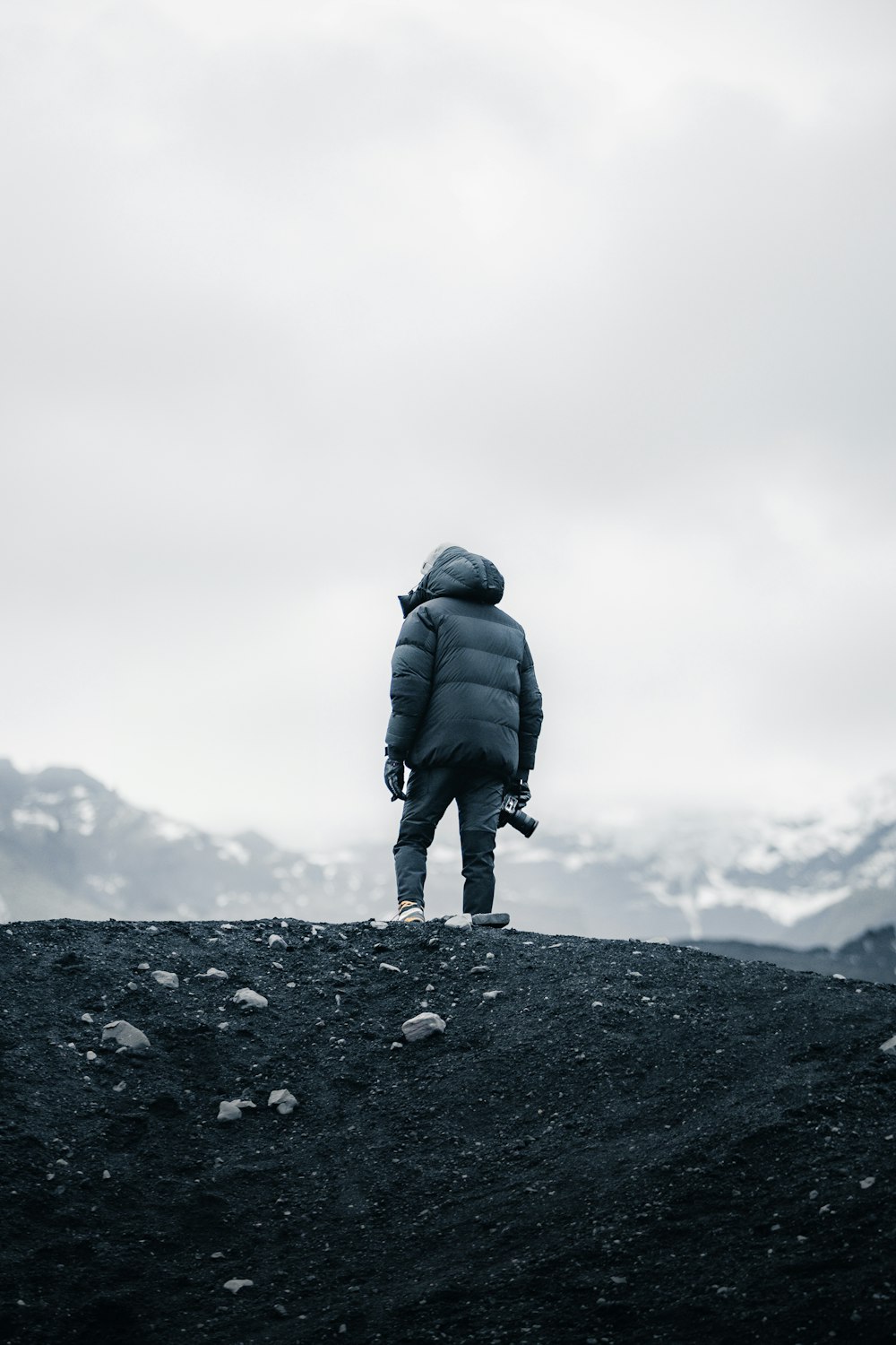 a person standing on top of a mountain