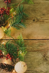 Close-up of handcrafted wooden signs and decorative elements for a festive event.