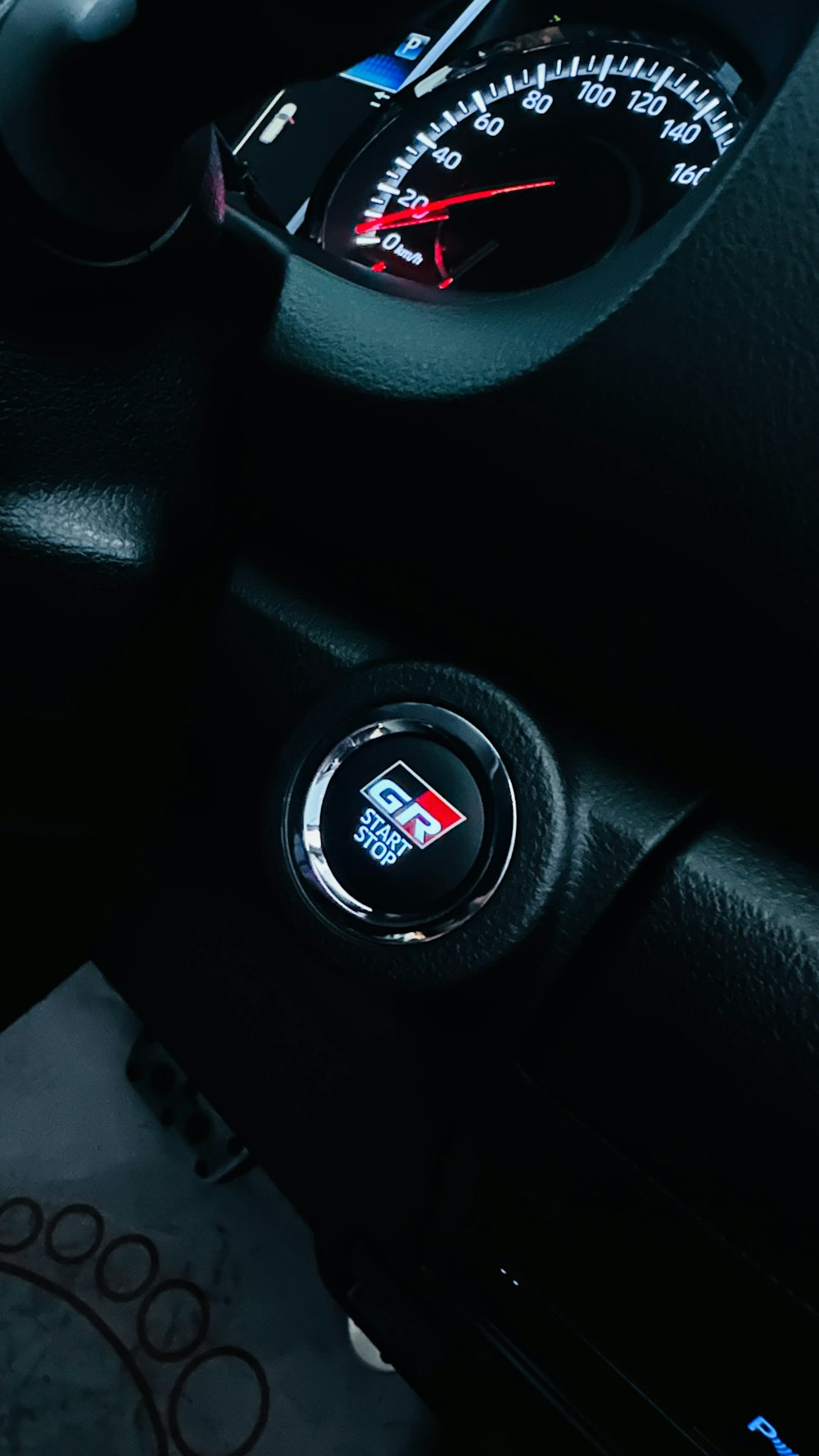 a close up of a car dashboard with a speedometer